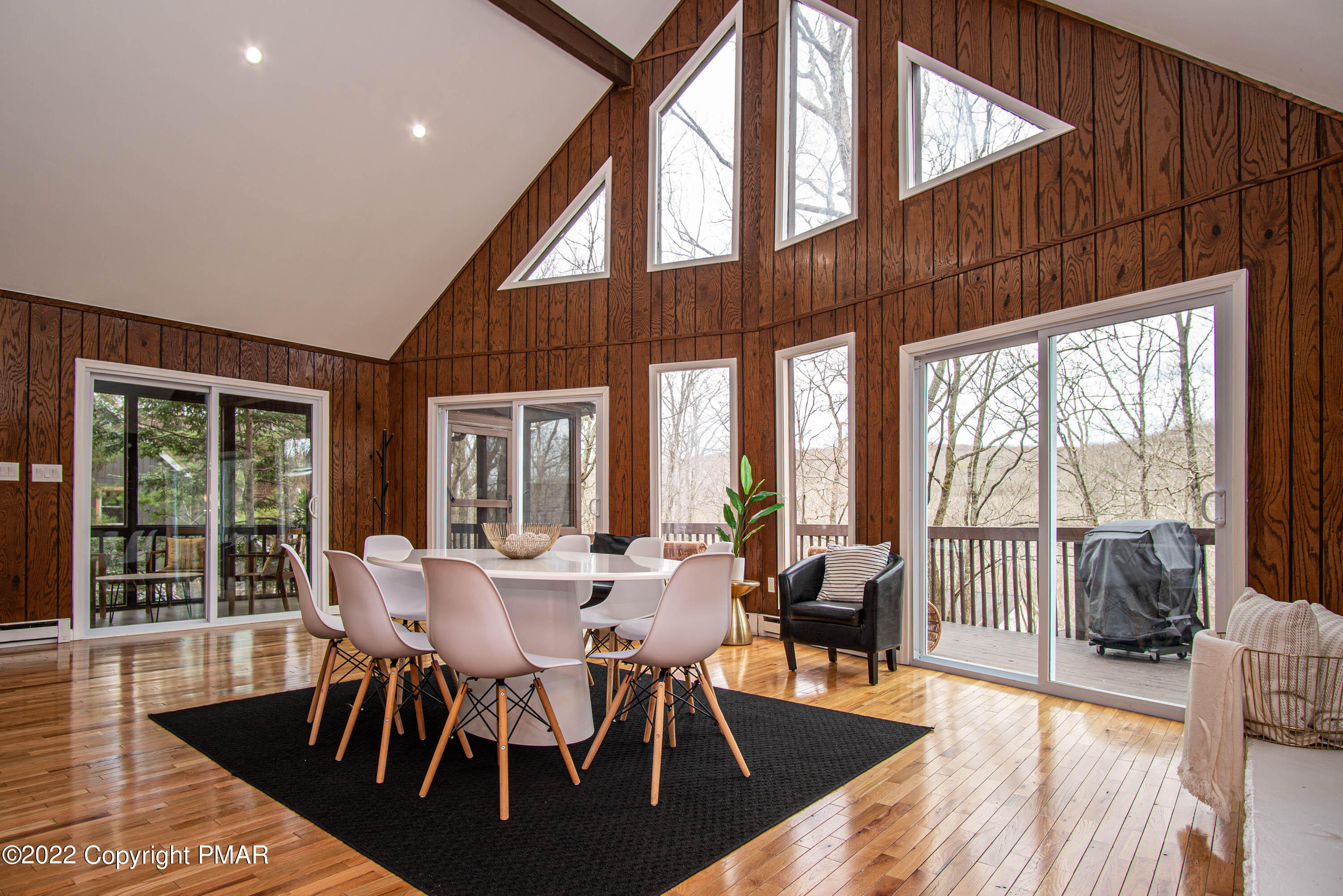 125 Edinburgh Road Bushkill, PA 18324 - Photo 6 of 64 a view of a dining room with furniture window and wooden floor