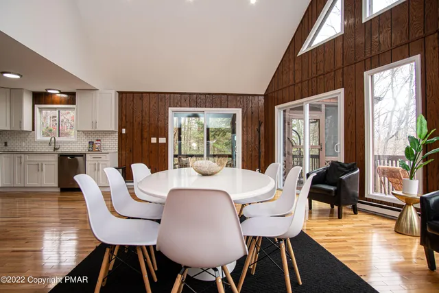 a kitchen with stainless steel appliances a refrigerator sink and microwave