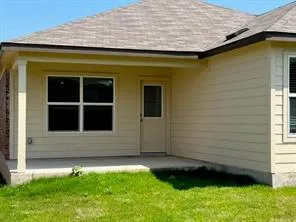 a view of a house with a garden