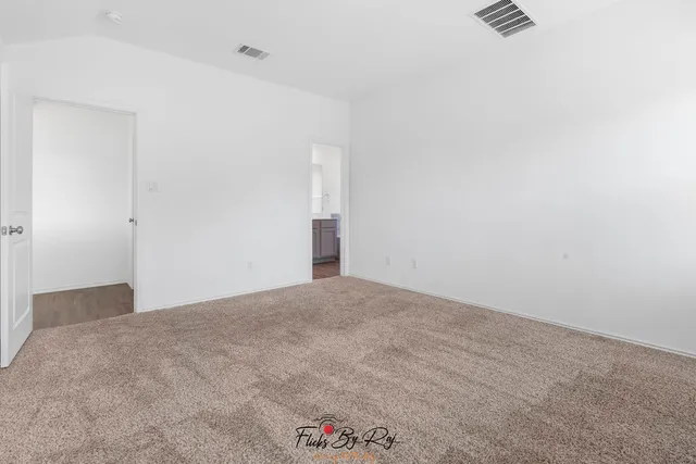 an empty room with windows