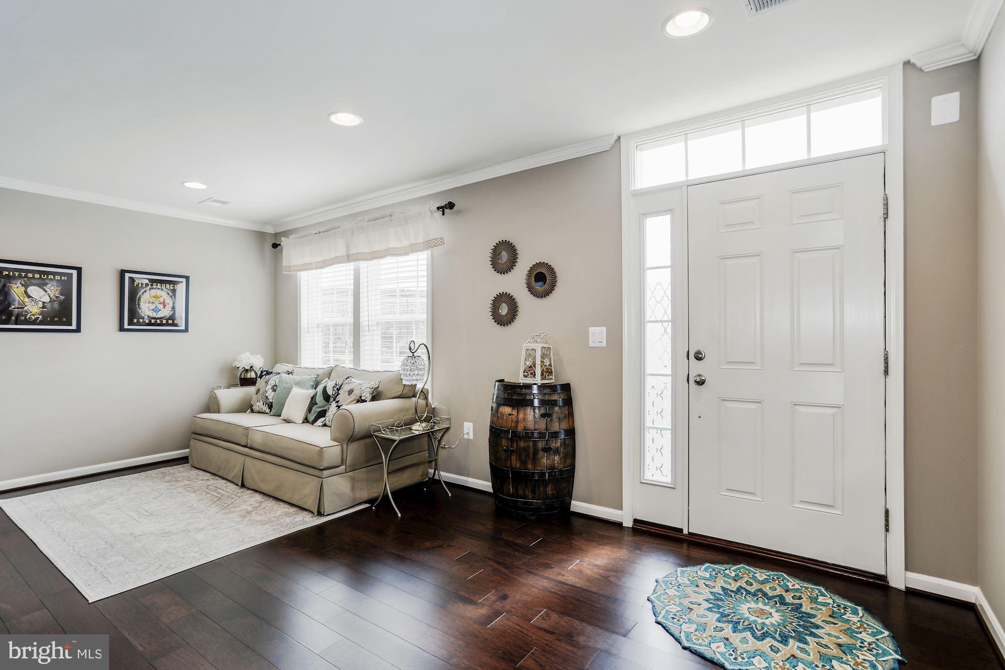 16004 Madison Ridge Place Gainesville, VA 20155 - Photo 8 of 49 First level living room