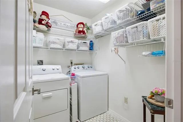a utility room with dryer and washer