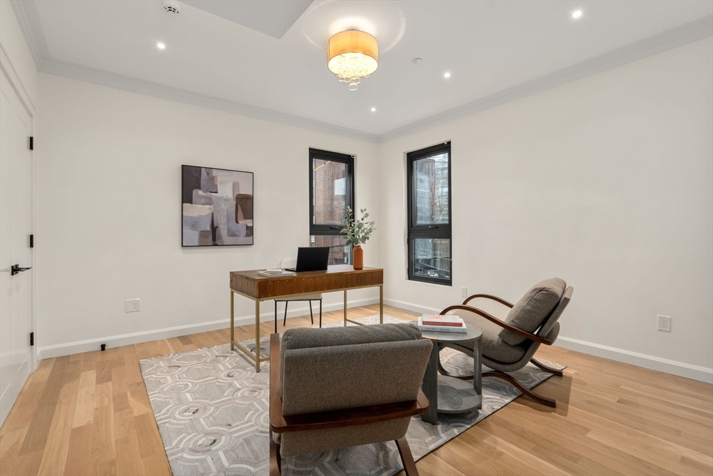 45 Stearns Road, Unit PH Brookline, MA 02446 - Photo 15 of 19 a living room with furniture and a rug