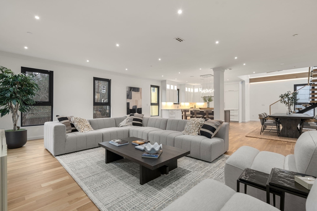 45 Stearns Road, Unit PH Brookline, MA 02446 - Photo 4 of 19 a living room with furniture or couch and a potted plant