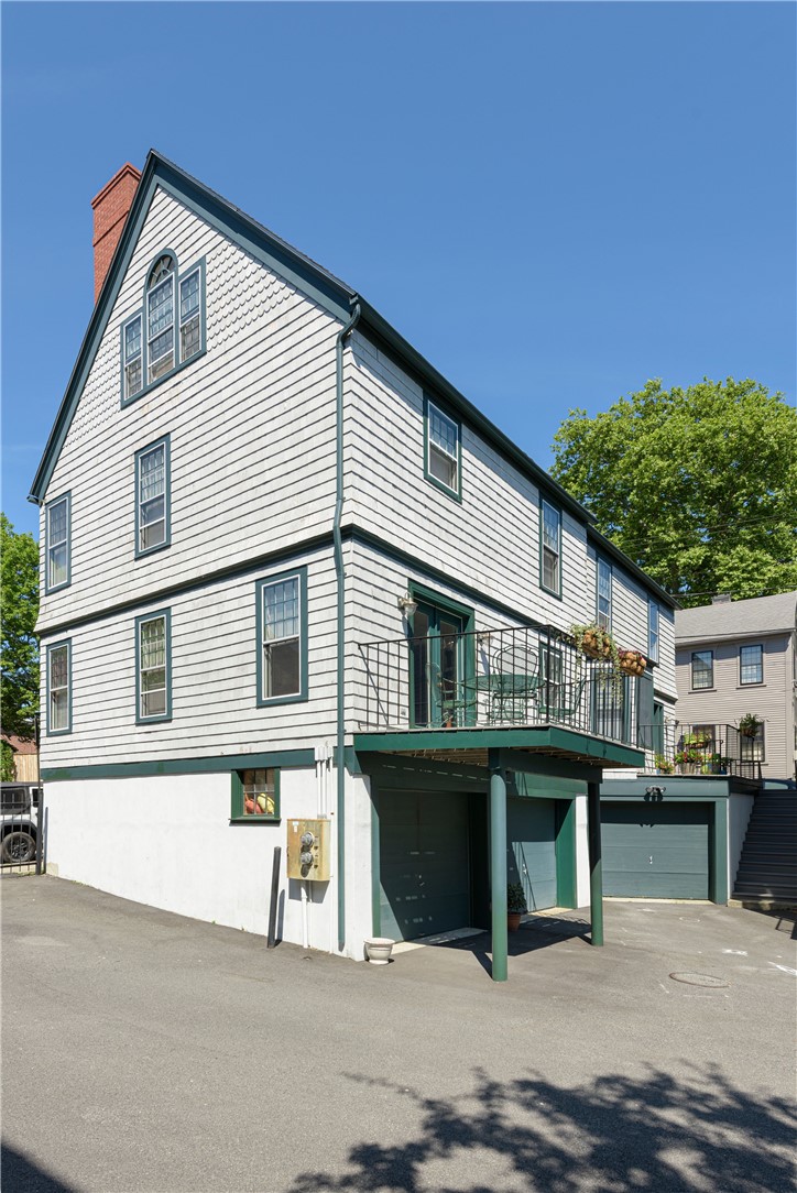 93 Mill Street, Unit B Newport, RI 02840 - Photo 28 of 33 Deck and two Garage spaces- note spacing