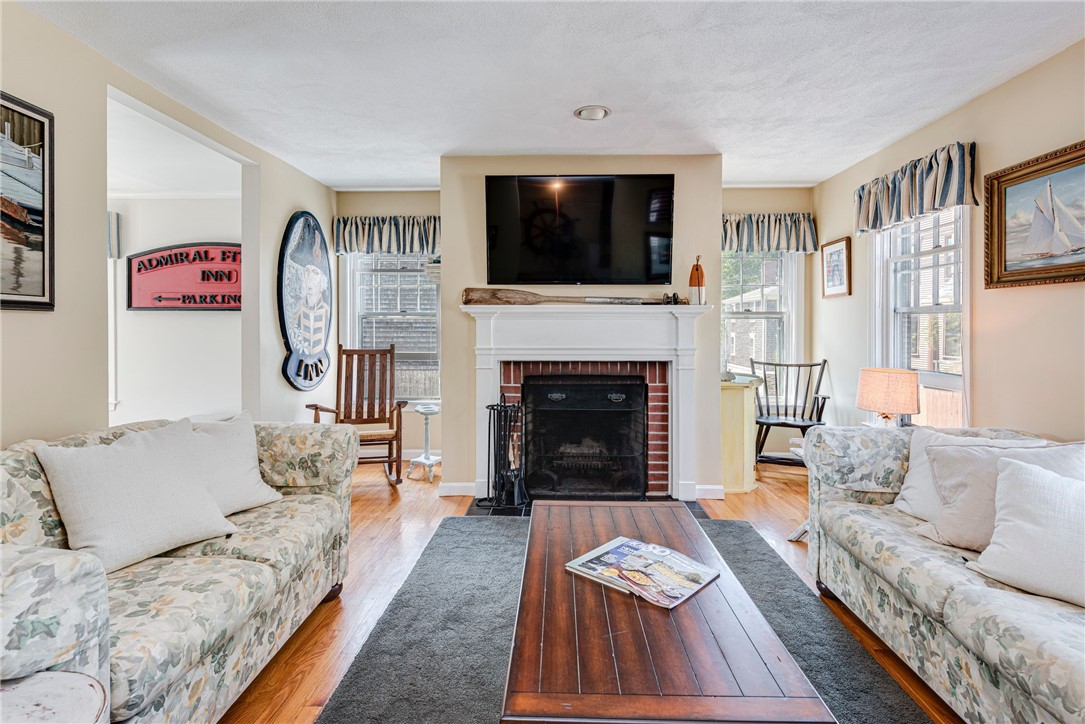 93 Mill Street, Unit B Newport, RI 02840 - Photo 8 of 33 Living room- wood fireplace