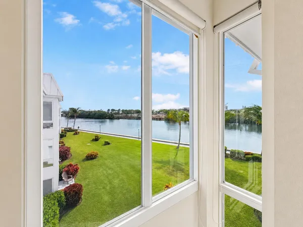 a view of swimming pool from a window