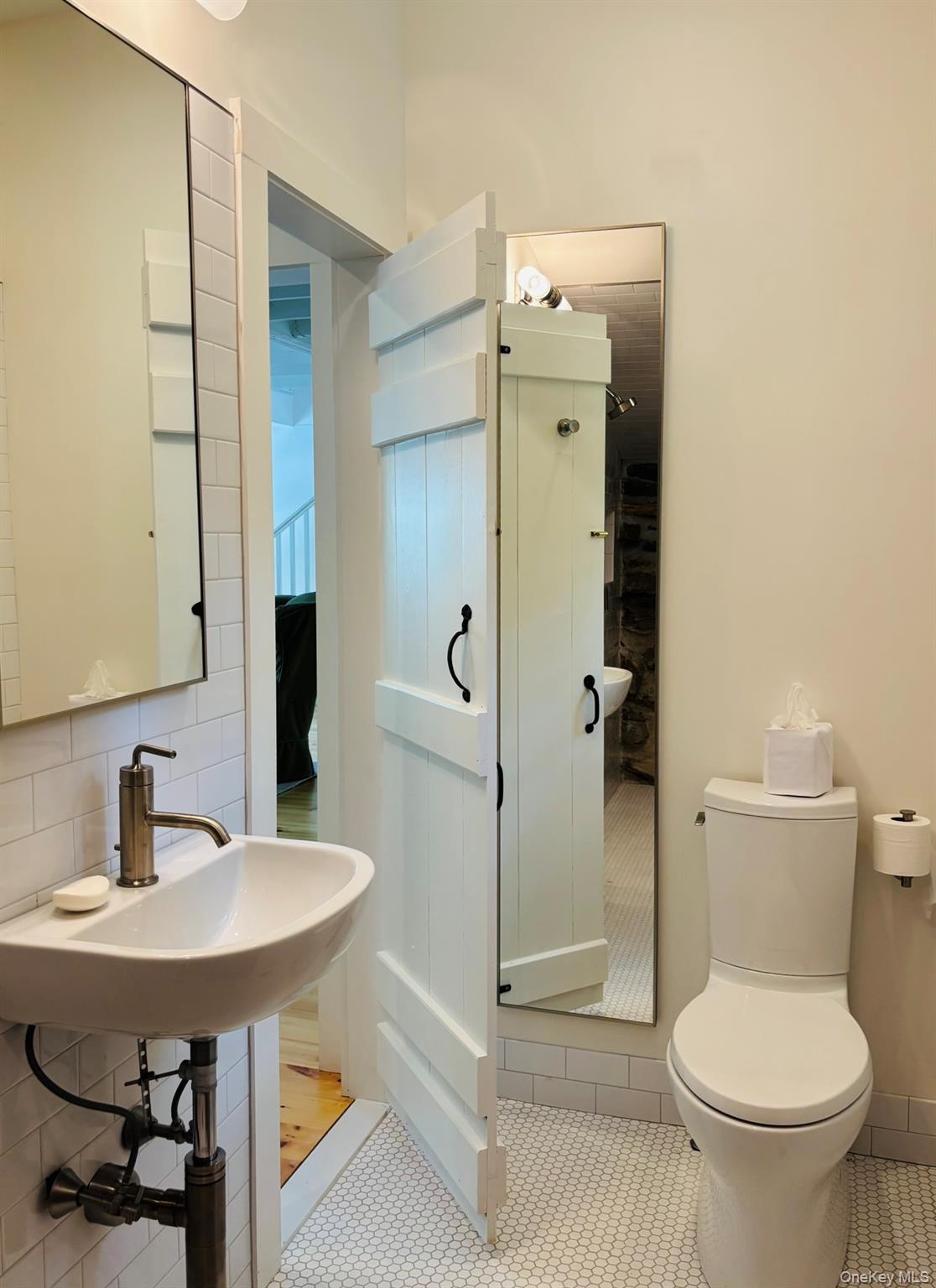 38 A Creemer Road Armonk, NY 10504 - Photo 12 of 23 The first floor bath with storage.