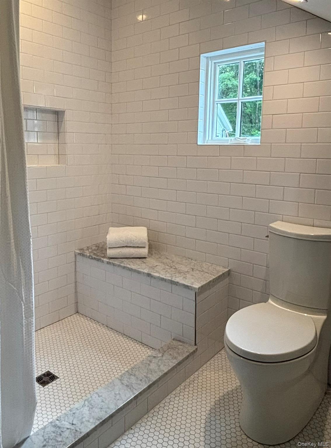 38 A Creemer Road Armonk, NY 10504 - Photo 20 of 23 A view of the newly tiled walk-in shower and toilet area.