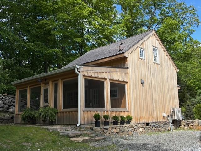 38 A Creemer Road Armonk, NY 10504 - Photo 2 of 23 The screened porch offers privacy and spectacular views of the meadows and sunsets.