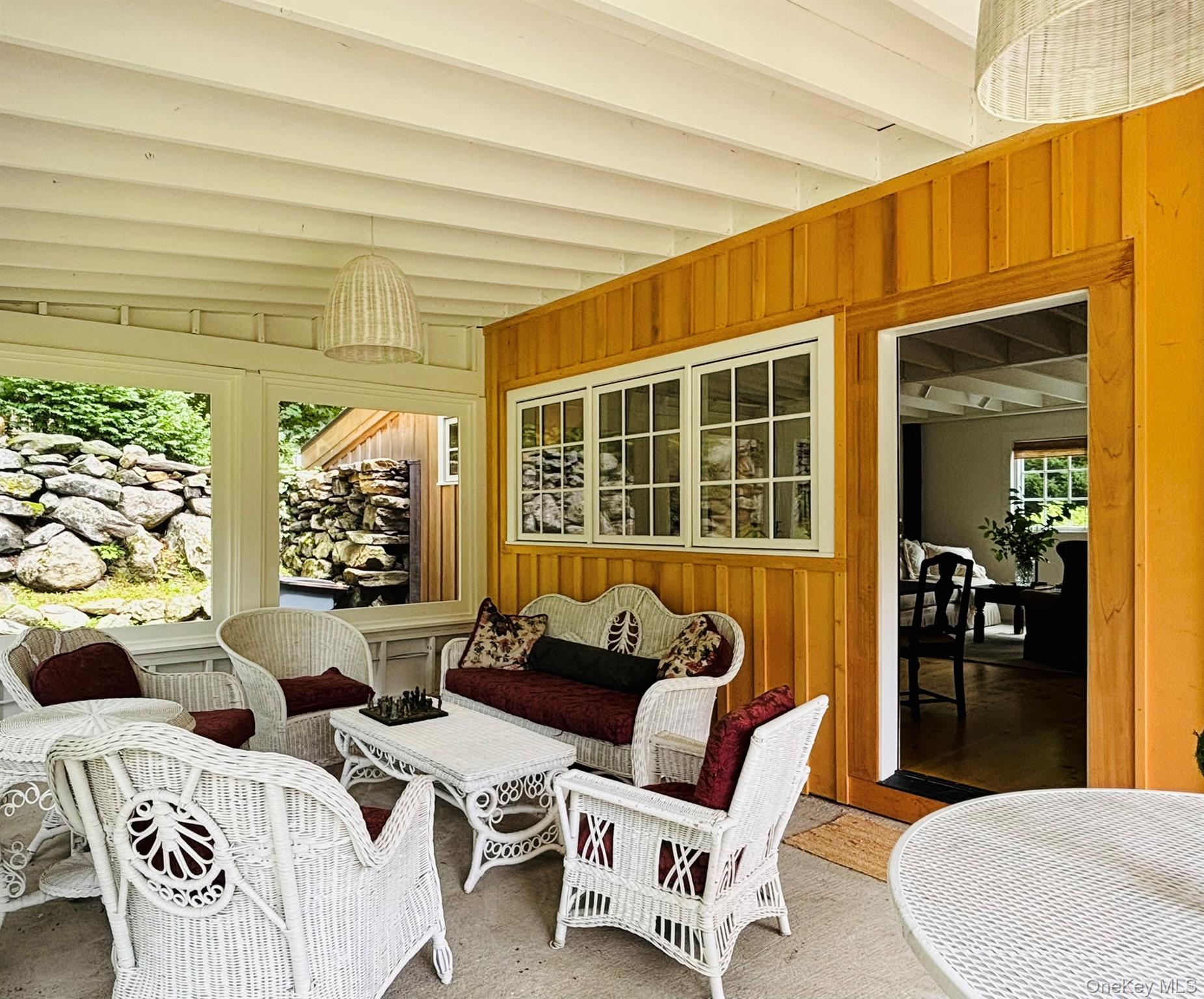 38 A Creemer Road Armonk, NY 10504 - Photo 3 of 23 The porch is the perfect entry to the cottage, serving as a mudroom/entry and as an extra 200 sqft of living space, perfect for greeting guests.