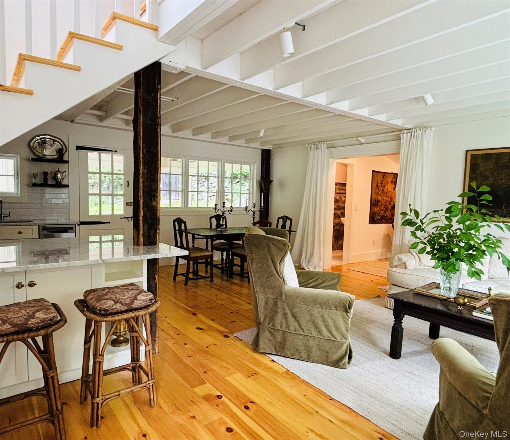38 A Creemer Road Armonk, NY 10504 - Photo 9 of 23 From the living room this view shows the door to the den/office with the adjoining full bath.