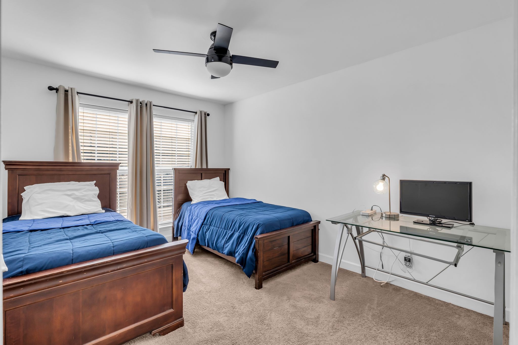 2272 Dewey Drive Spring Hill, TN 37174 - Photo 8 of 14 a spacious bedroom with a bed and a tv
