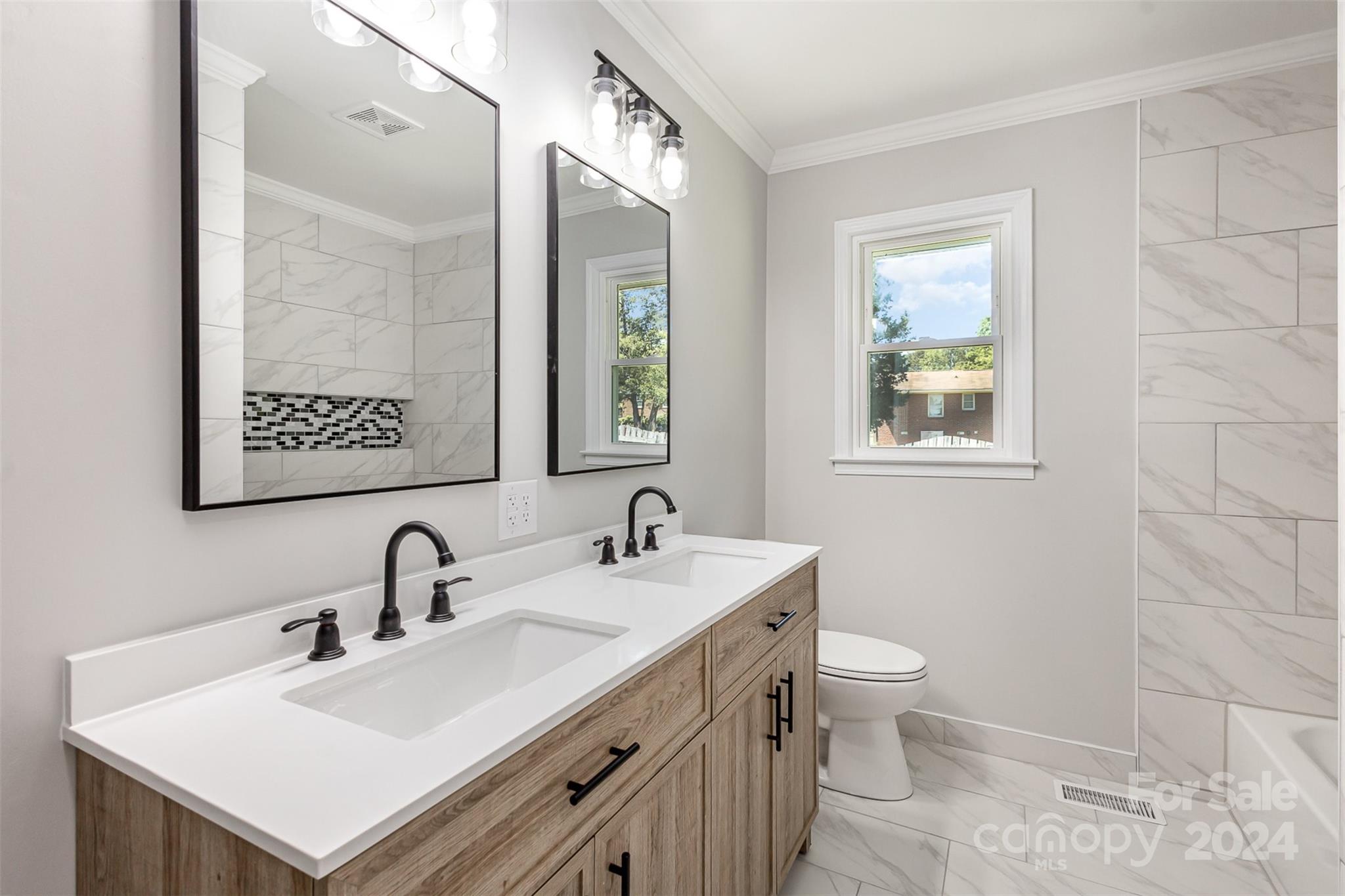 613 Unique Street Chester, SC 29706 - Photo 20 of 27 a bathroom with a sink toilet and mirror