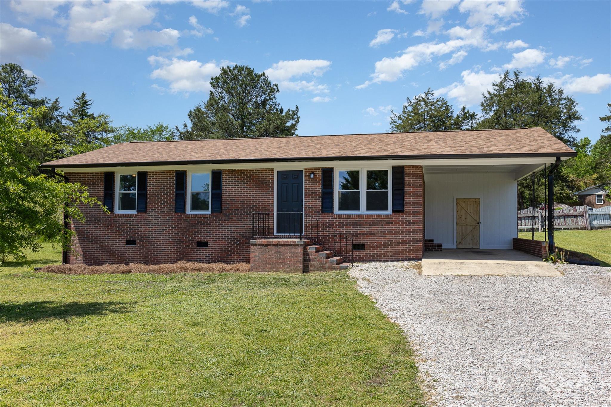613 Unique Street Chester, SC 29706 - Photo 2 of 27 a house view with a garden space