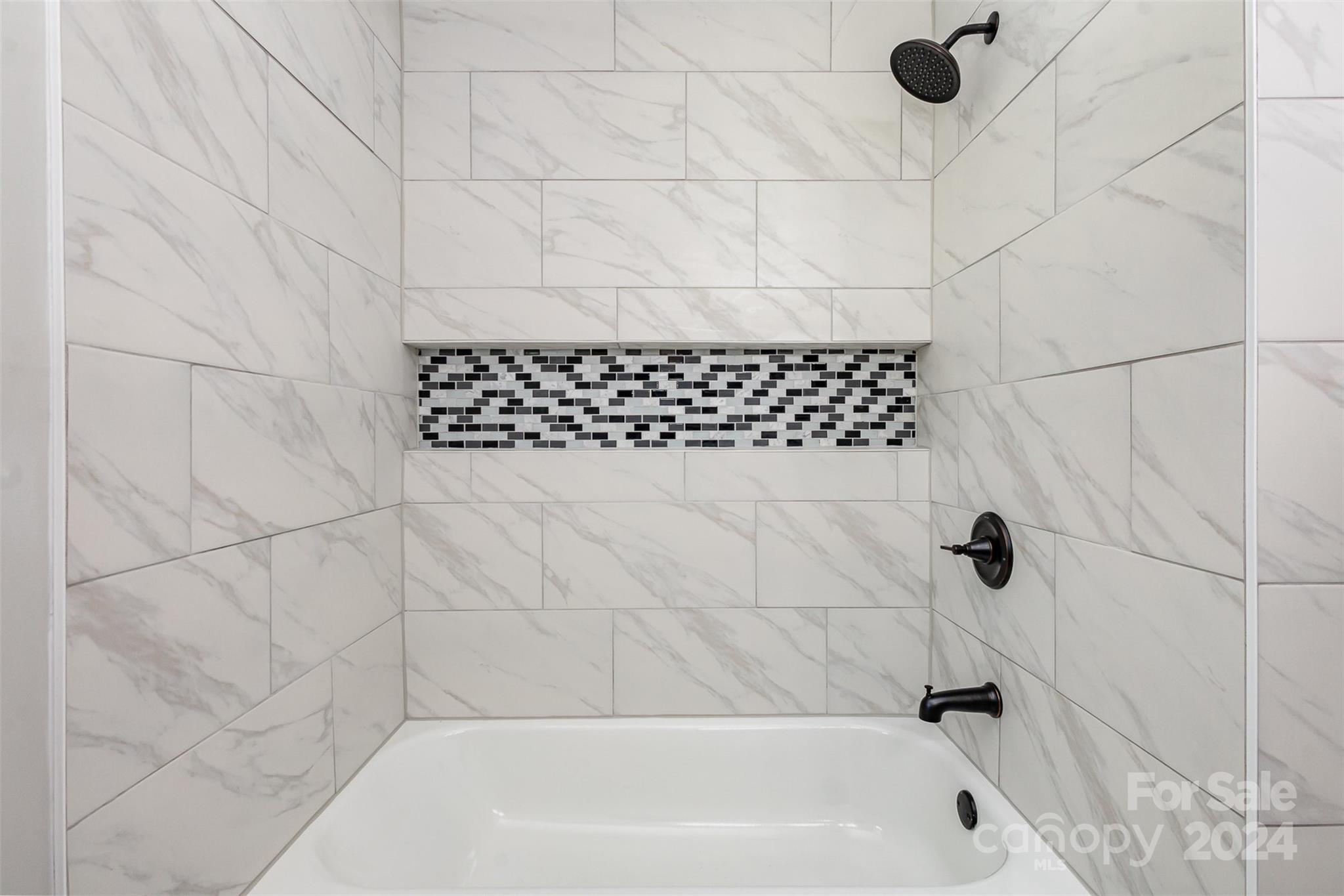 613 Unique Street Chester, SC 29706 - Photo 21 of 27 a bathroom with a bathtub