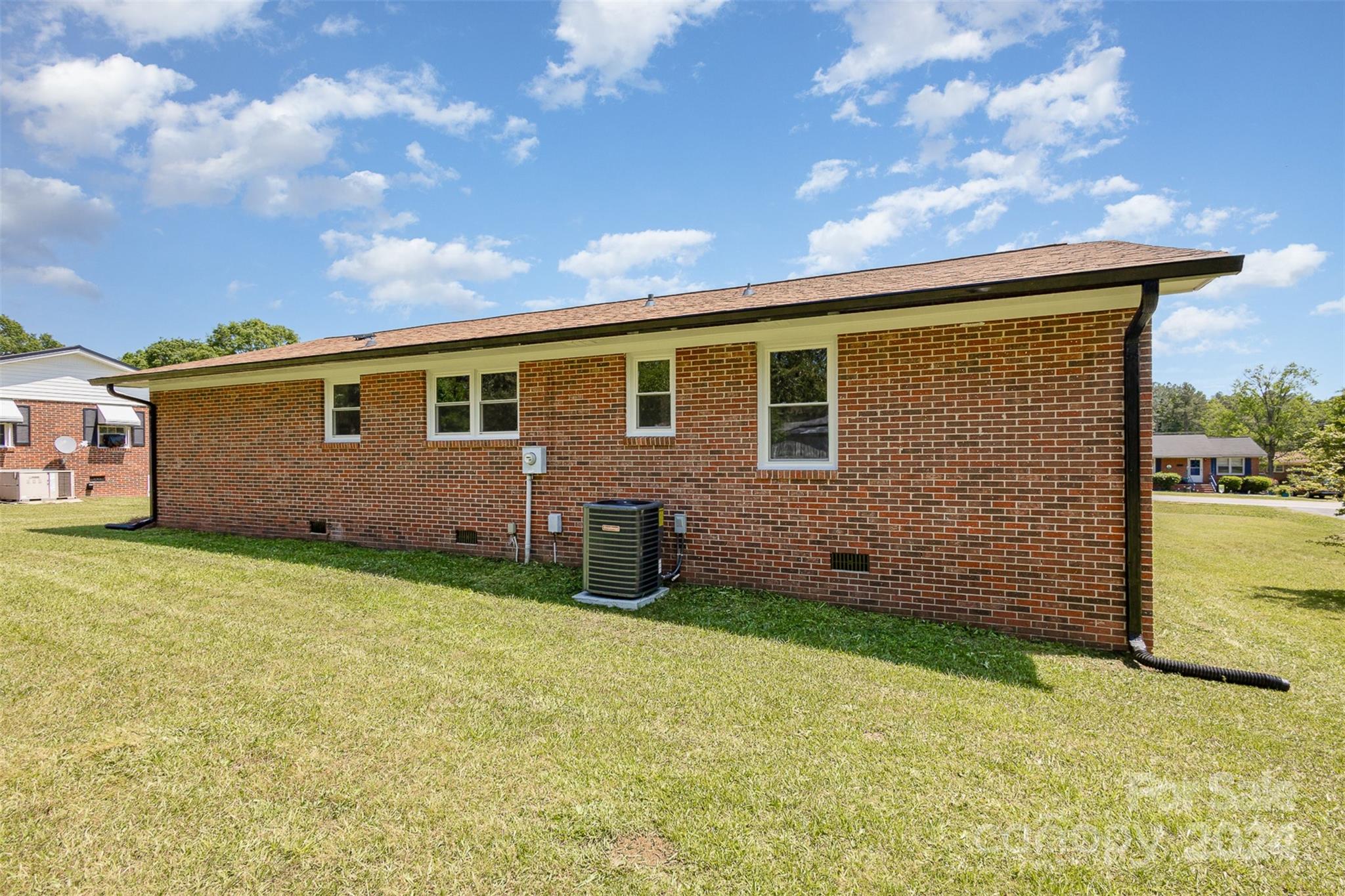 613 Unique Street Chester, SC 29706 - Photo 23 of 27 a backyard of a house with lots of green space