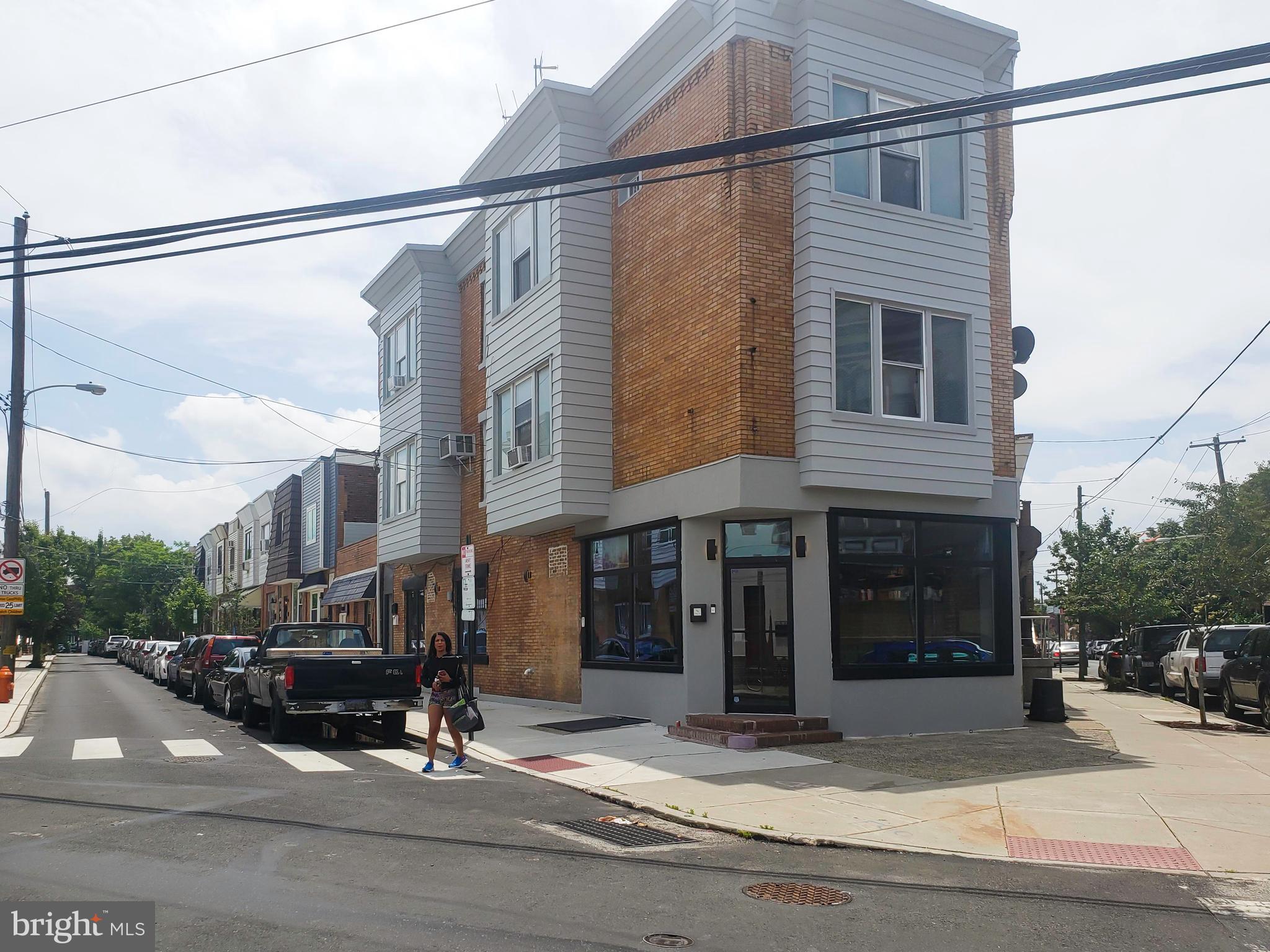 1501 South 12th Street, Unit 3F Philadelphia, PA 19147 - Photo 1 of 23 a view of a building with a street