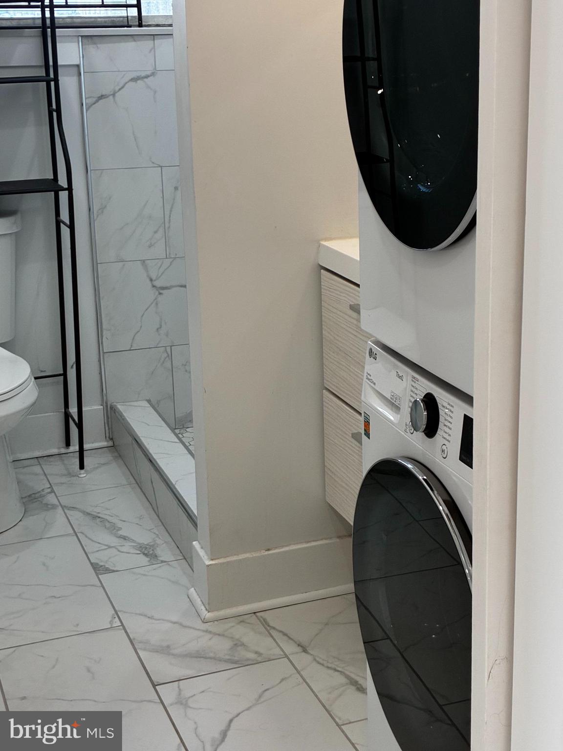 1501 South 12th Street, Unit 3F Philadelphia, PA 19147 - Photo 11 of 23 a bathroom with a sink and a mirror