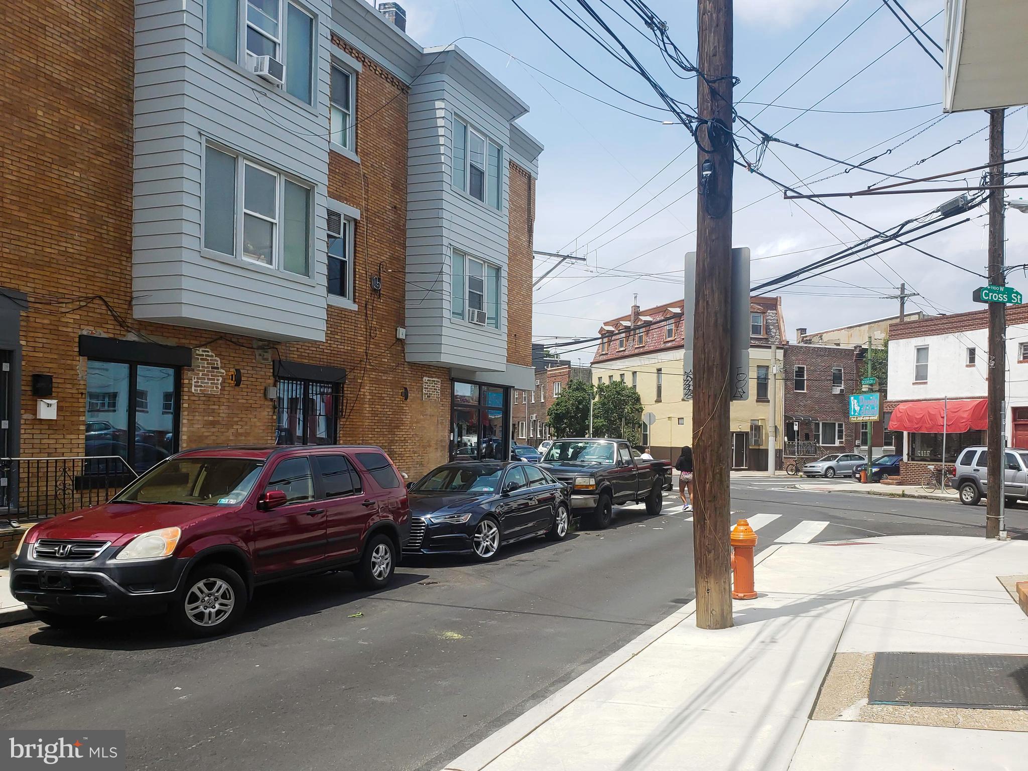1501 South 12th Street, Unit 3F Philadelphia, PA 19147 - Photo 21 of 23 a car parked in front of a building