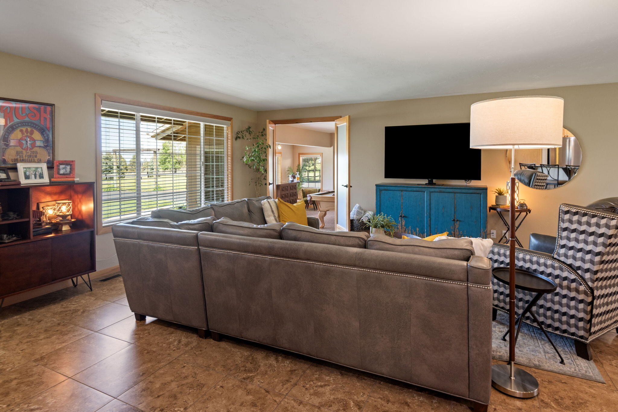 22539 Martee Lane Bend, OR 97701 - Photo 5 of 54 a living room with furniture and a flat screen tv