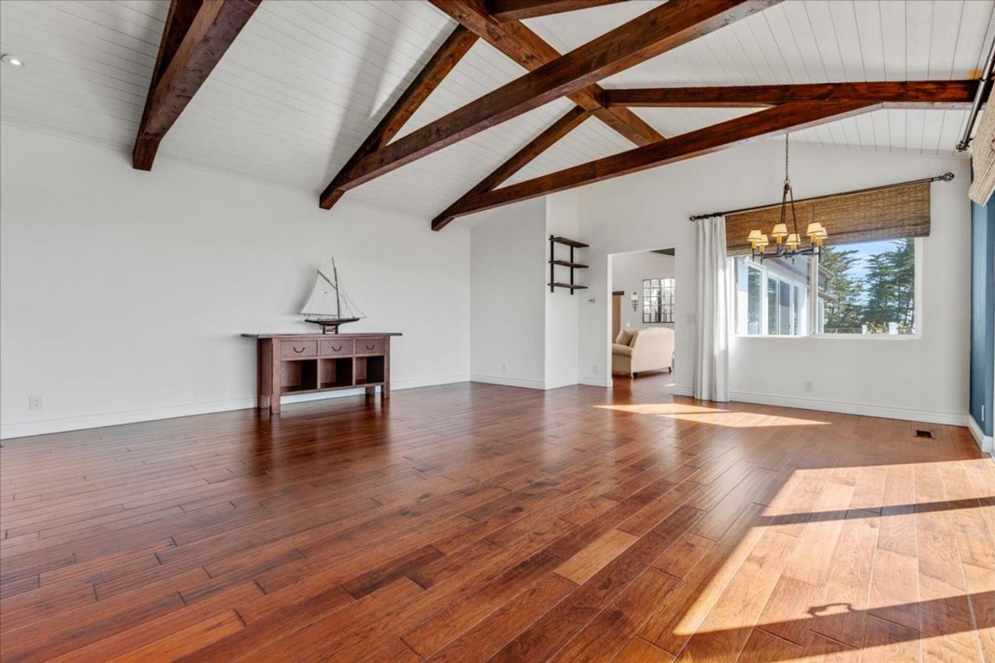 15 Mentone Road Carmel, CA 93923 - Photo 17 of 47 a view of empty room with wooden floor and fan