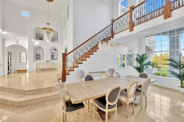 a kitchen with stainless steel appliances granite countertop a sink and a stove