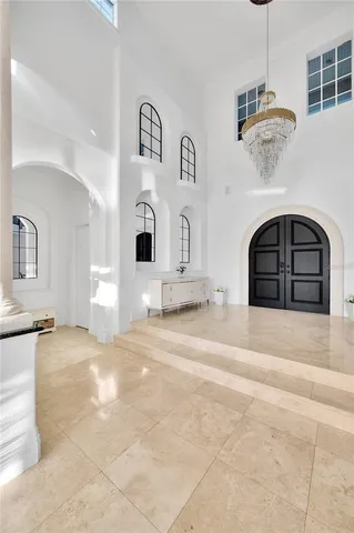a kitchen with stainless steel appliances granite countertop a stove and a sink