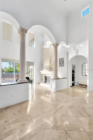 a kitchen with stainless steel appliances granite countertop a sink and dishwasher with white cabinets