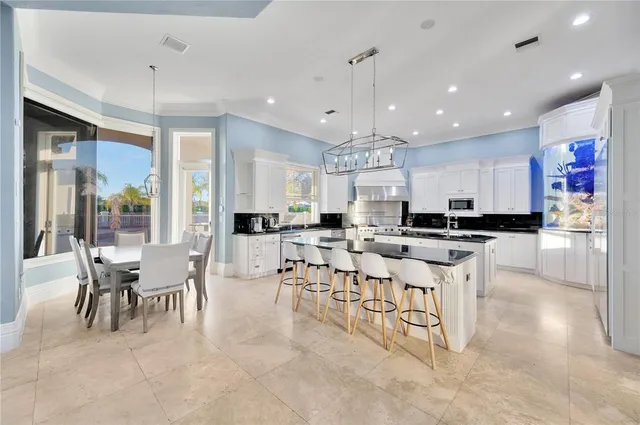 a view of a house with a yard and a garden