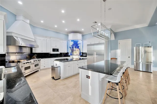 front view of a brick house with a yard