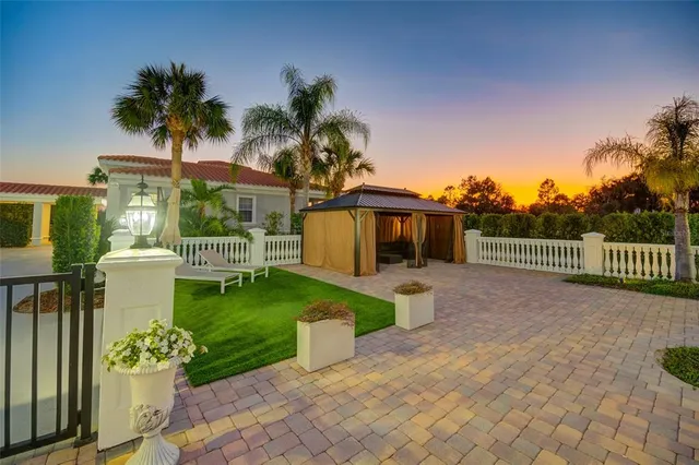a view of a dining room with furniture and window