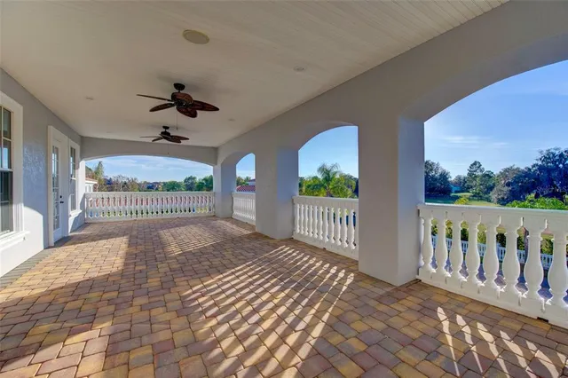a large living room with large windows