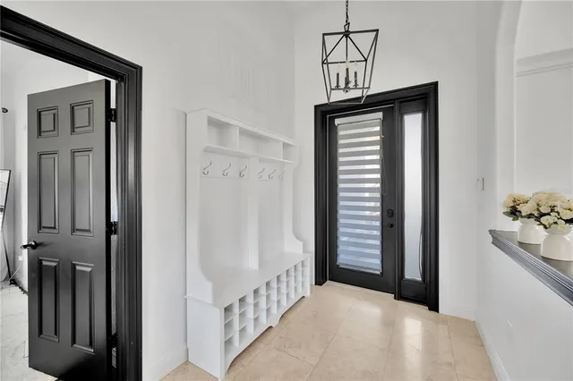 an aerial view of a house with a garden