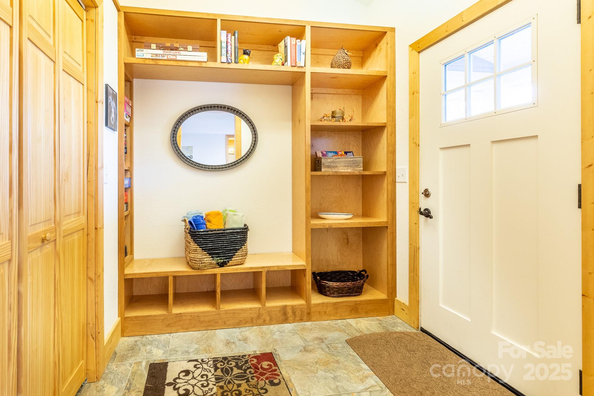 283 Walnut Cv Ridge Bryson City, NC 28713 - Photo 16 of 42 a view of a door and chair in a bathroom