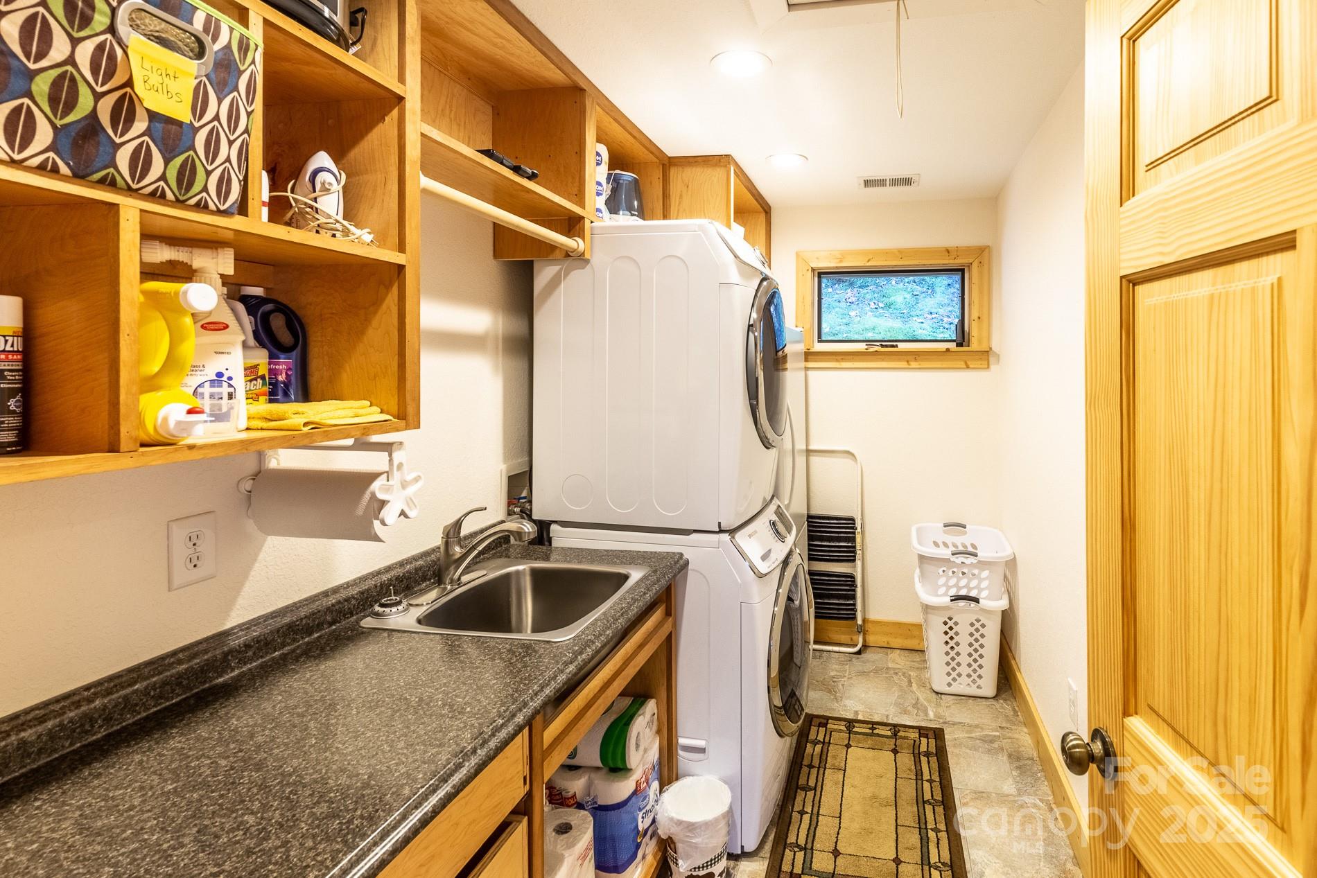 283 Walnut Cv Ridge Bryson City, NC 28713 - Photo 21 of 42 a bathroom with a sink and a mirror