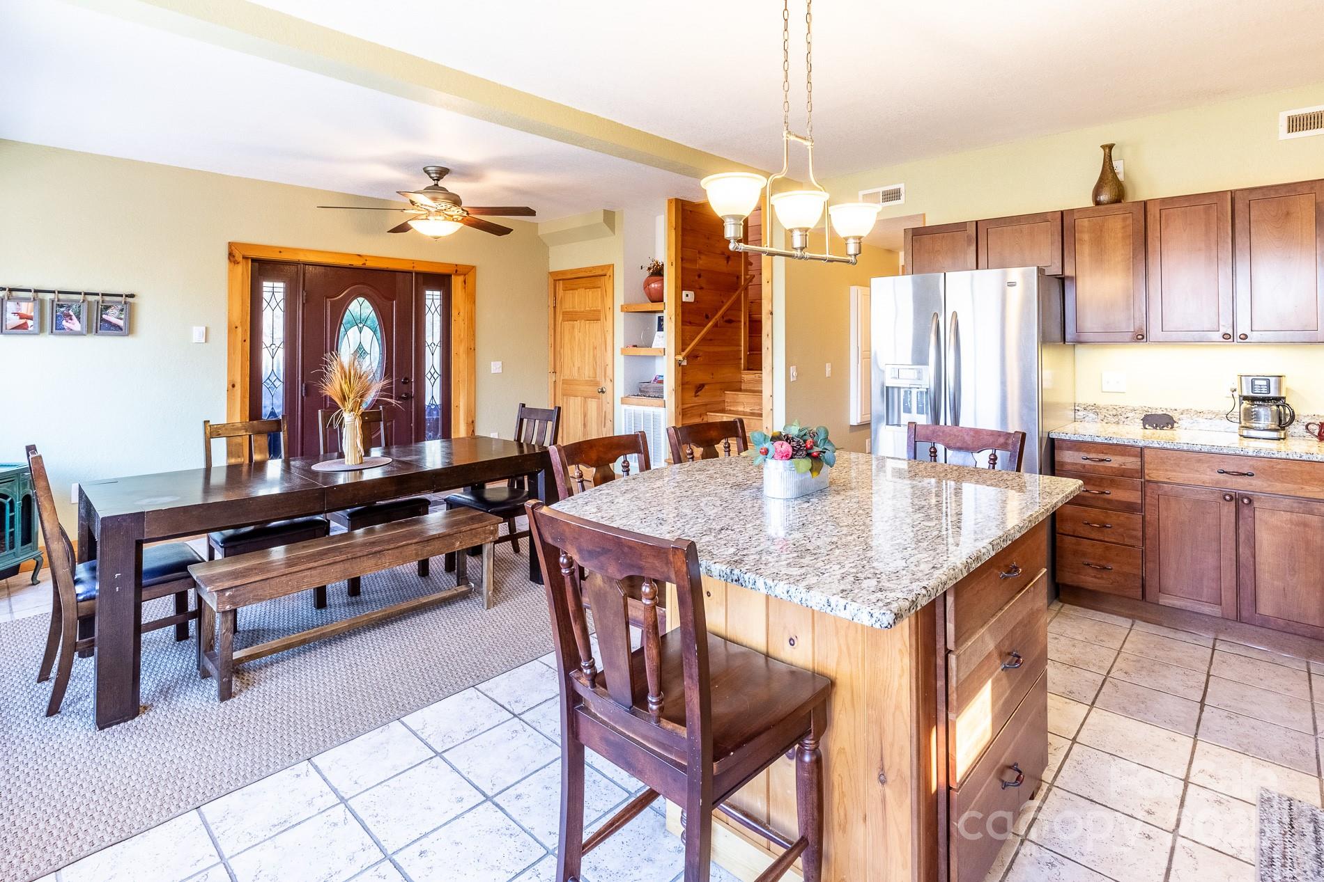 283 Walnut Cv Ridge Bryson City, NC 28713 - Photo 29 of 42 a kitchen with a counter space a sink and cabinets
