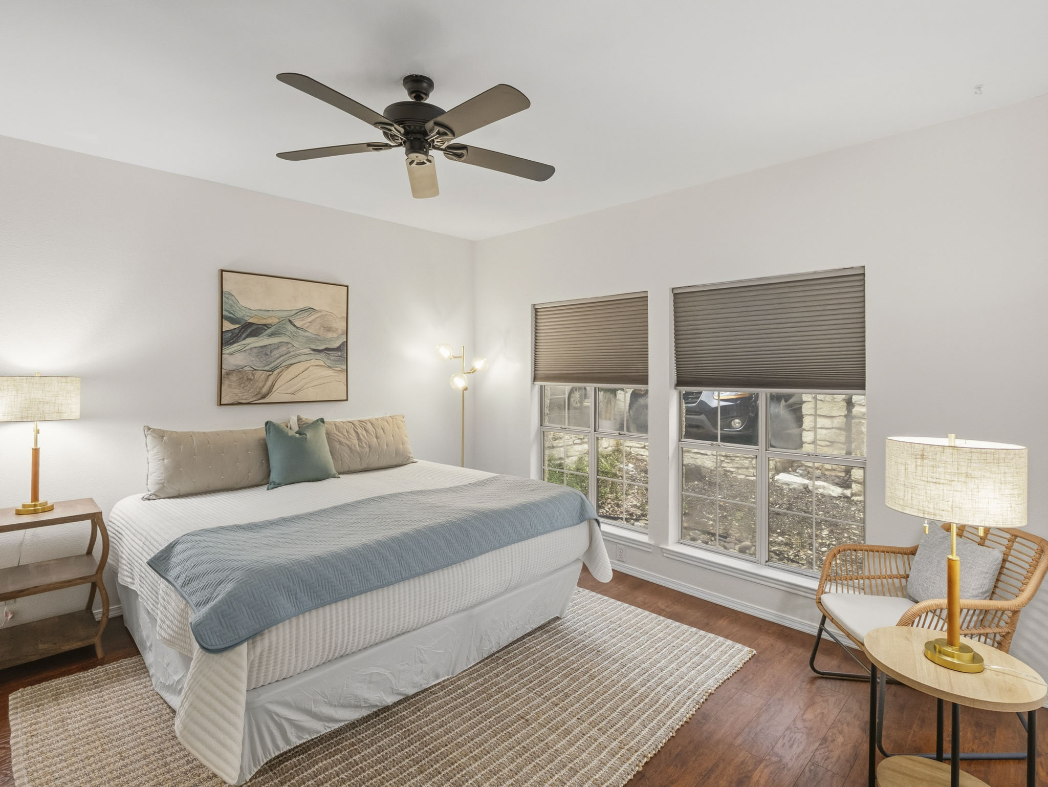 3809 Spicewood Springs Road, Unit 137 Austin, TX 78759 - Photo 10 of 34 The primary suite is a welcome oasis with this King size Bed and features 2 closets.