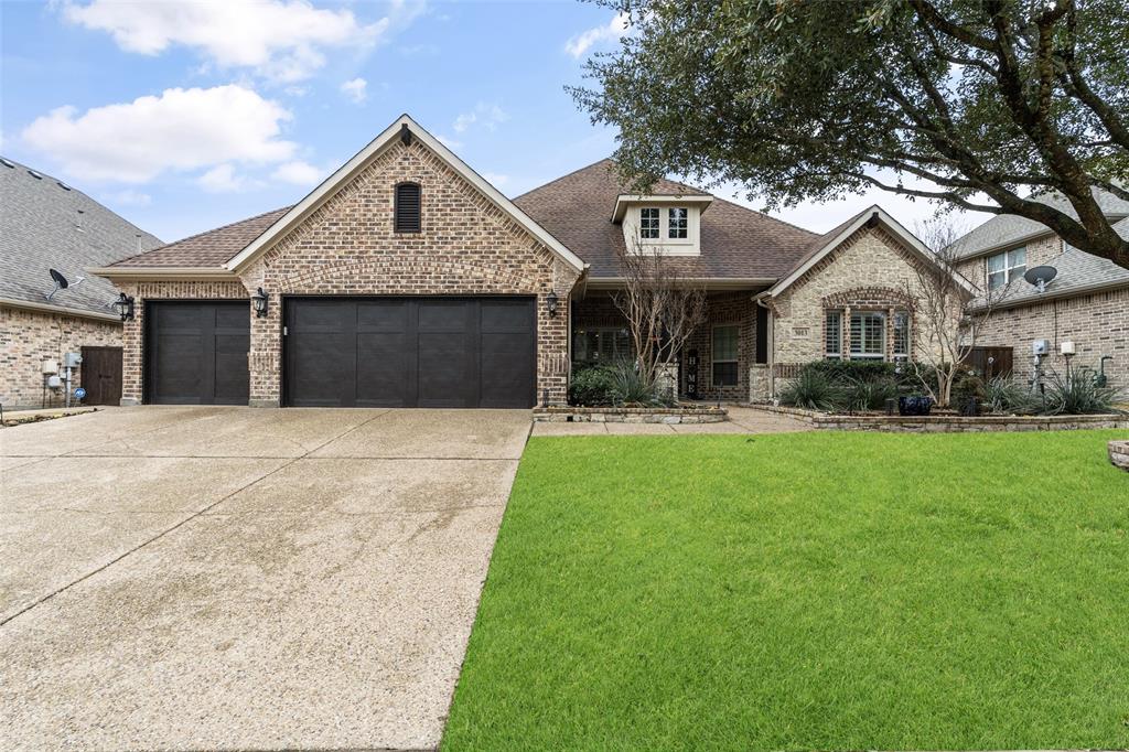 3013 Nathan Drive Wylie, TX 75098 - Photo 1 of 1 a front view of a house with a yard and trees