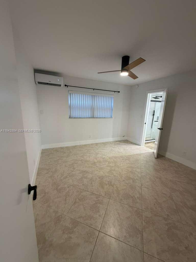 3208 Colony Club Road, Unit 2 Pompano Beach, FL 33062 - Photo 12 of 18 a view of empty room