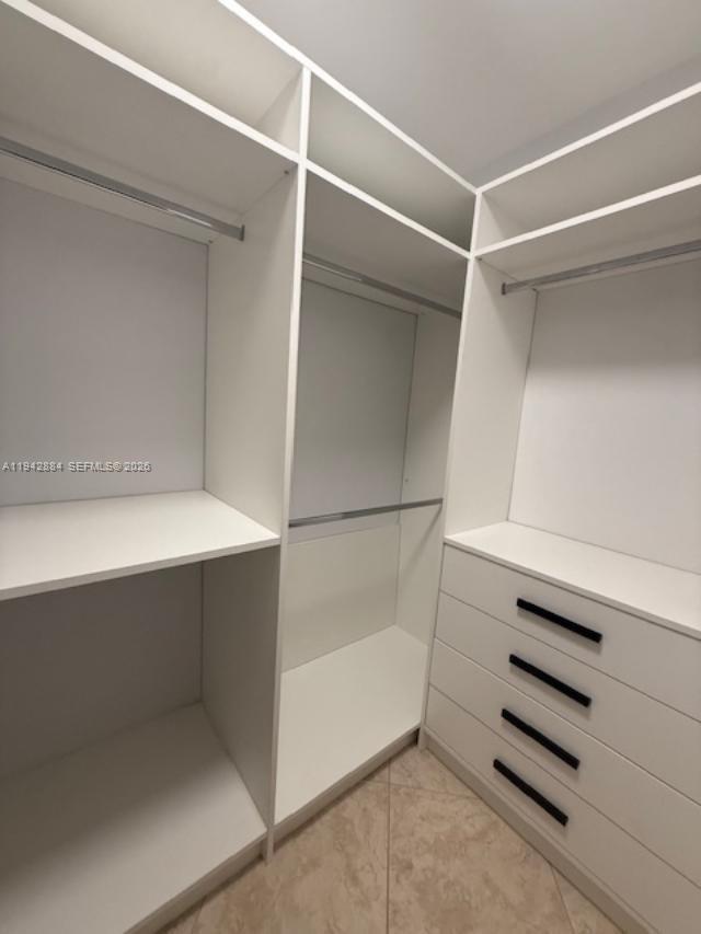 3208 Colony Club Road, Unit 2 Pompano Beach, FL 33062 - Photo 17 of 18 a view of walk in closet