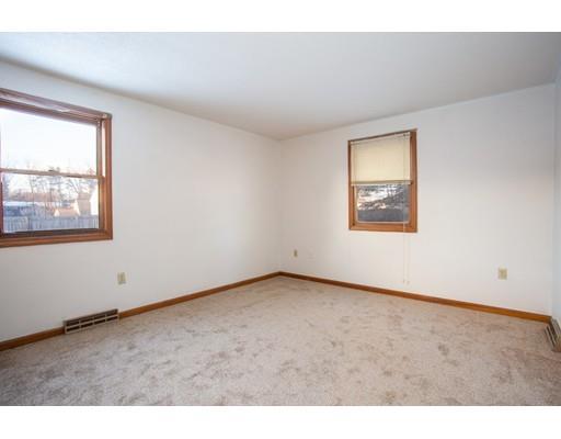152 Starling Road Springfield, MA 01119 - Photo 15 of 28 an empty room with windows