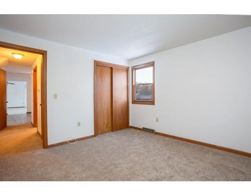 152 Starling Road Springfield, MA 01119 - Photo 16 of 28 an empty room with windows and closet
