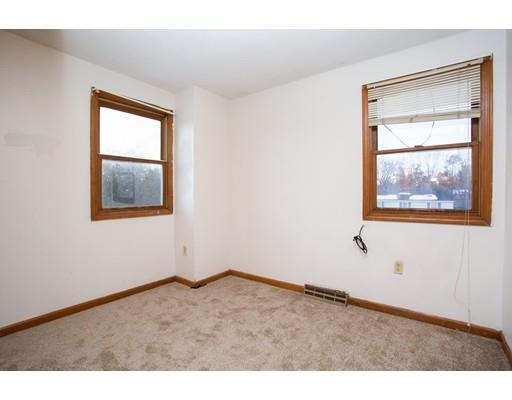 152 Starling Road Springfield, MA 01119 - Photo 18 of 28 a view of an empty room with a window