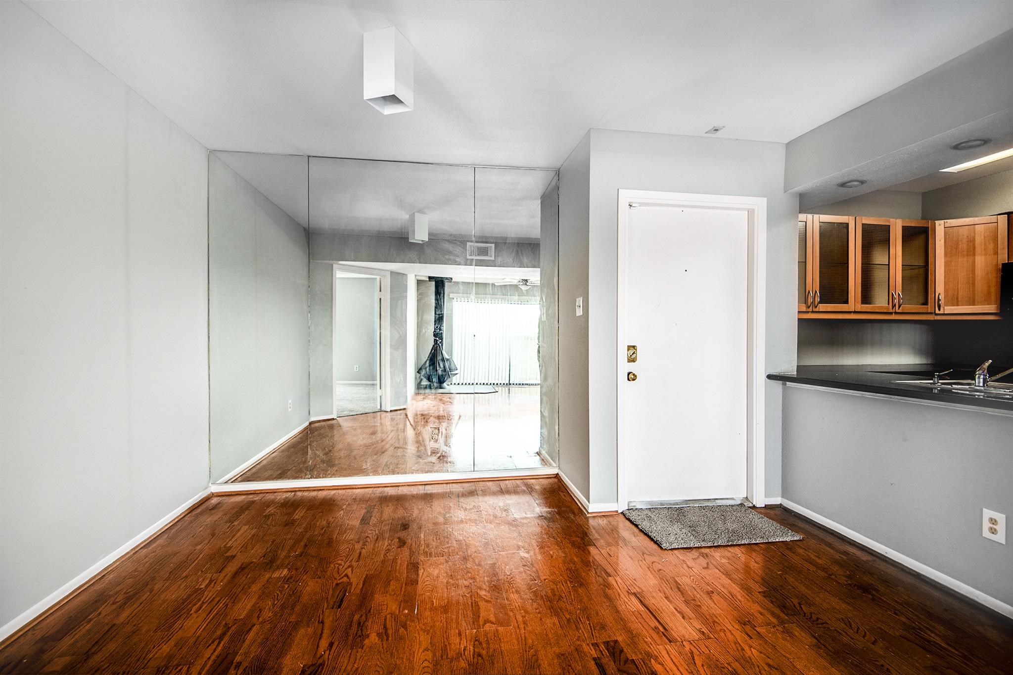 a view of an empty room and window