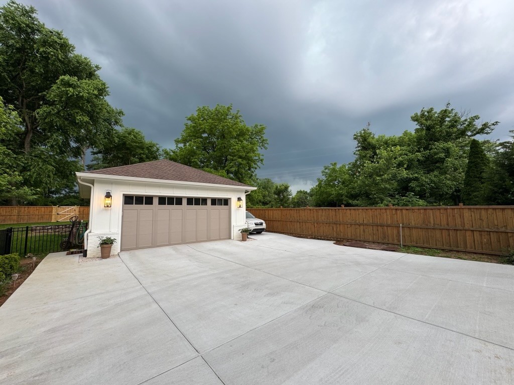 347 Blackman Road Nashville, TN 37211 - Photo 18 of 18 a view of a house with a yard and large trees