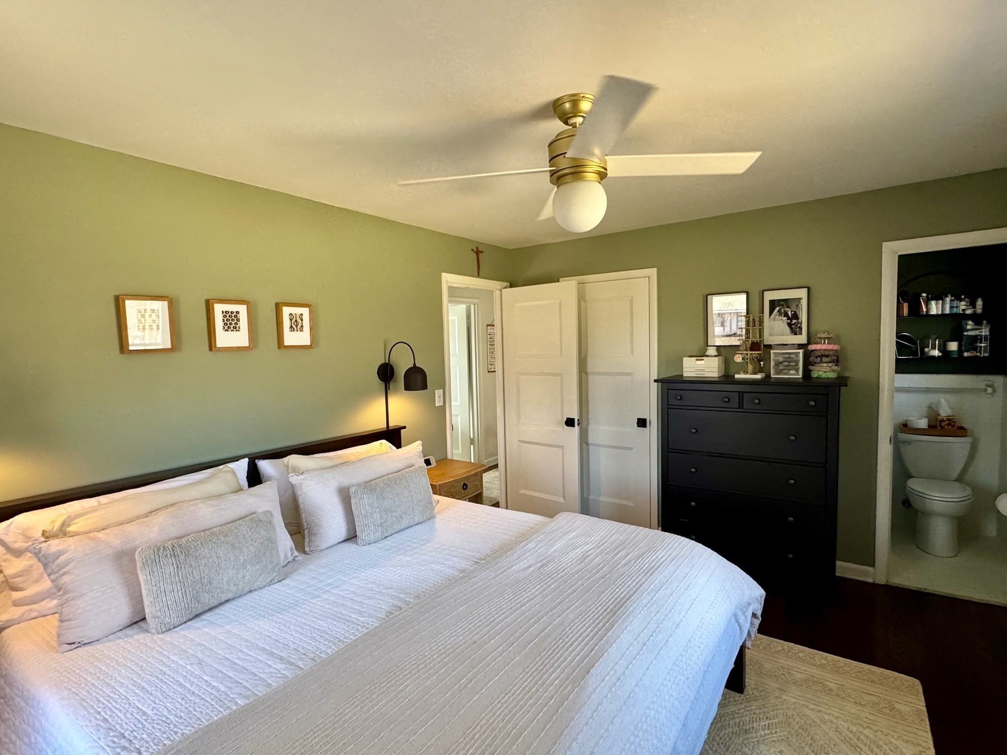 347 Blackman Road Nashville, TN 37211 - Photo 10 of 18 a bedroom with a bed and wooden floor