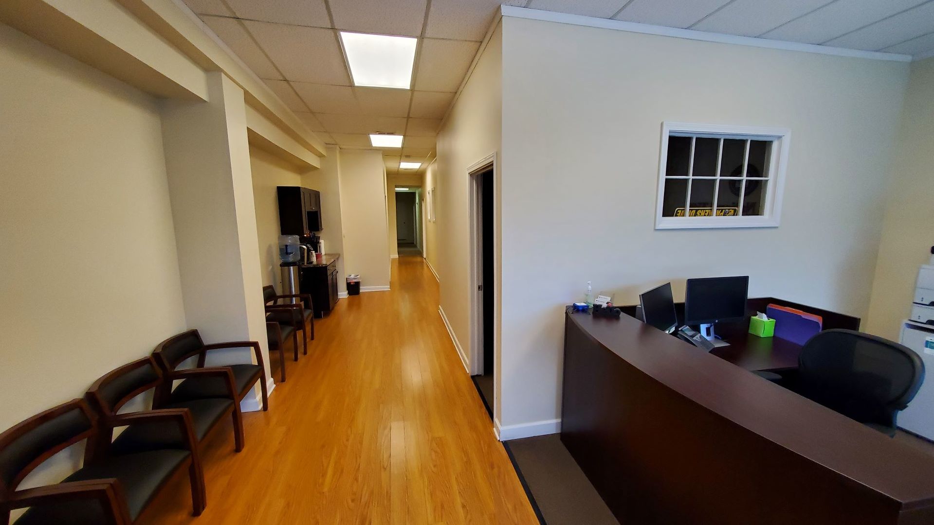 137 Cedar Avenue, Unit B Lake Villa, IL 60046 - Photo 3 of 11 a hallway with a view of living room with wooden floor
