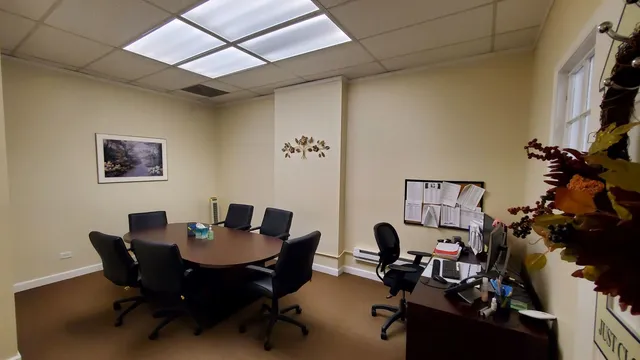 a view of workspace with wooden floor