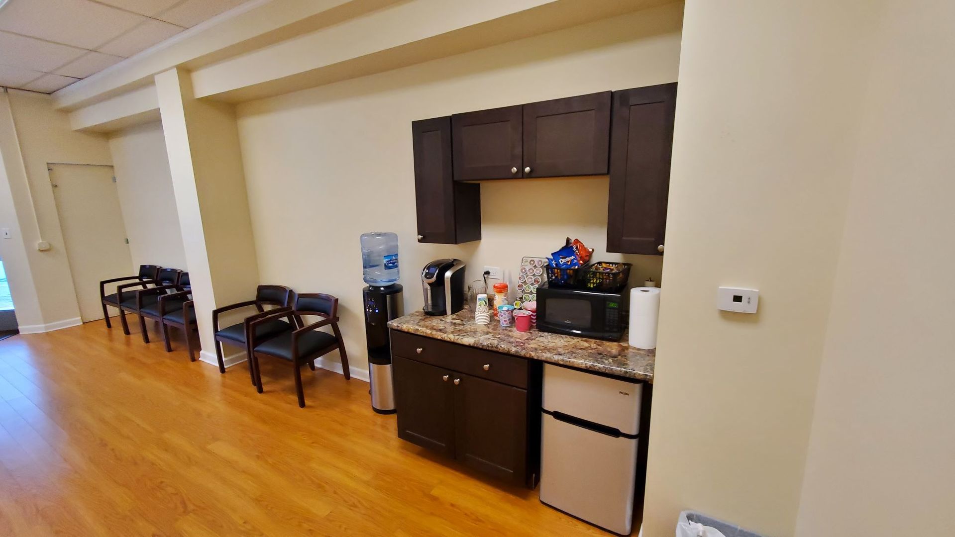 137 Cedar Avenue, Unit B Lake Villa, IL 60046 - Photo 6 of 11 a kitchen with a sink appliances and cabinets
